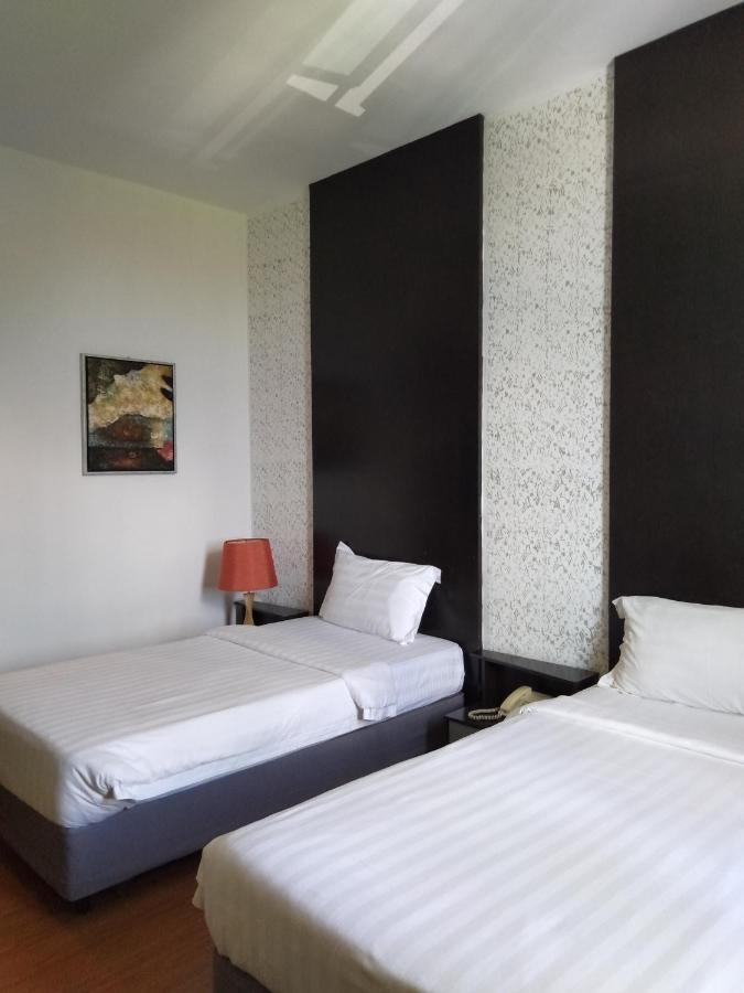 Ginasuite Kompleks27 Hotel بندر سير بيجوانا المظهر الخارجي الصورة