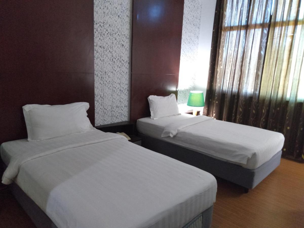 Ginasuite Kompleks27 Hotel بندر سير بيجوانا المظهر الخارجي الصورة