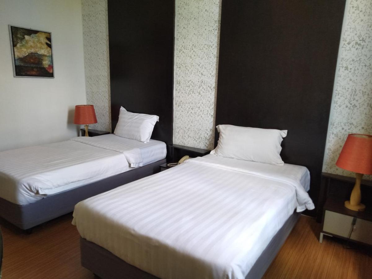 Ginasuite Kompleks27 Hotel بندر سير بيجوانا المظهر الخارجي الصورة