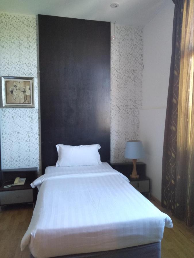 Ginasuite Kompleks27 Hotel بندر سير بيجوانا المظهر الخارجي الصورة
