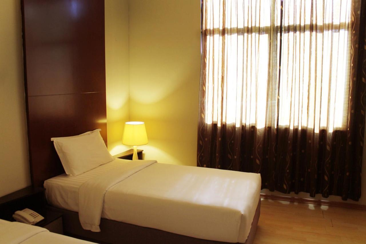 Ginasuite Kompleks27 Hotel بندر سير بيجوانا الغرفة الصورة